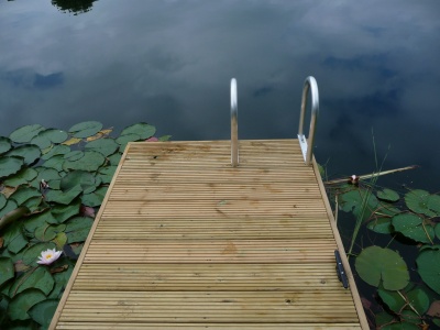 Oak clad jetty with swimming access